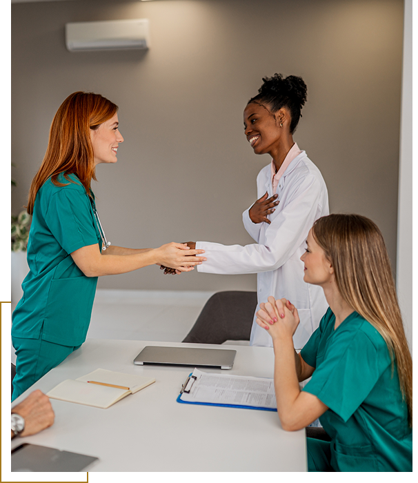 Doctors and nurses discussing patient care