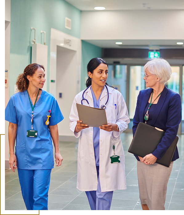 Doctors and nurse in conversation