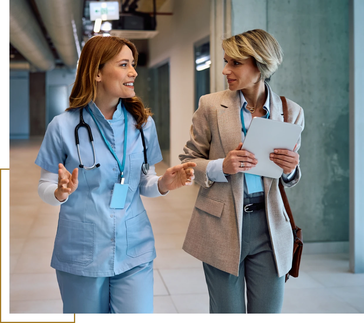 Medical staff walking and conversing together